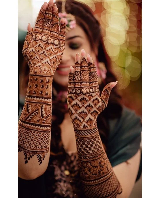 Refined Ruffle And Anklet Covering Modern Full Hand Mehndi Design